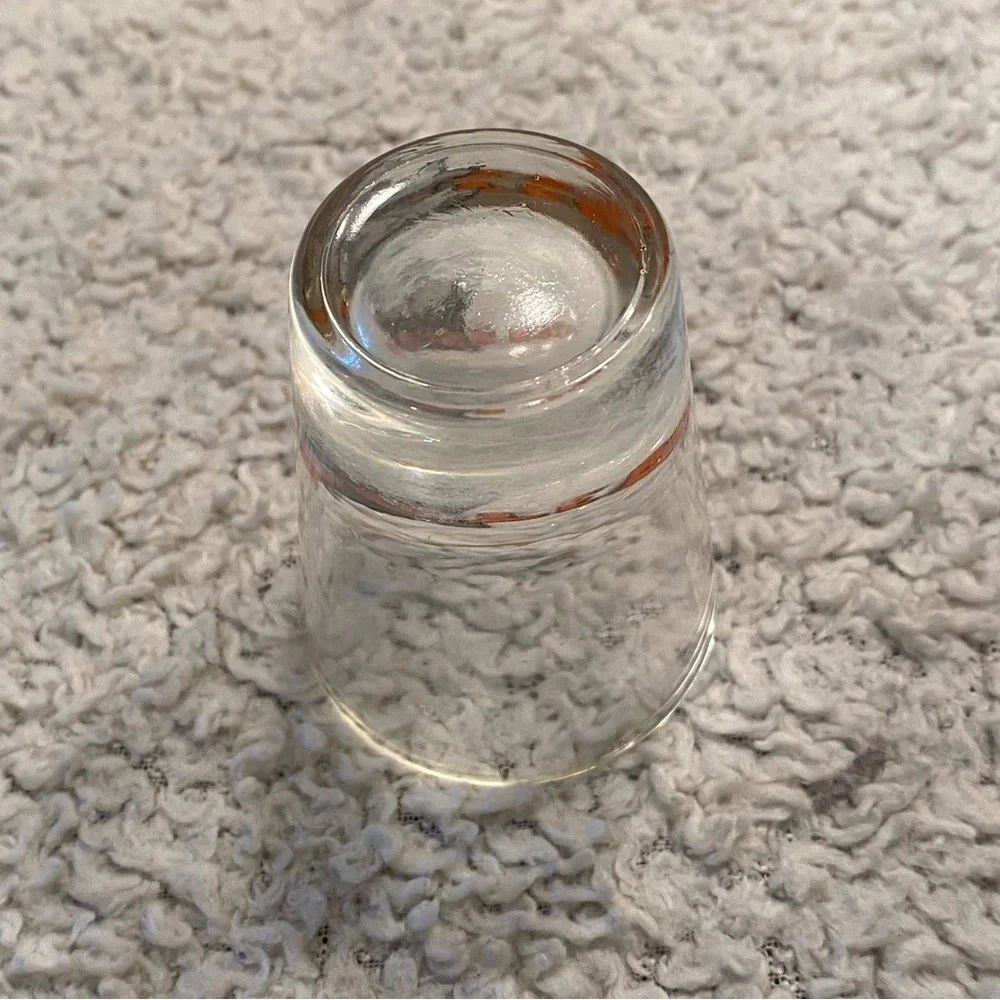 Hooter’s shot glass,  white orange with owl logo, no city specified